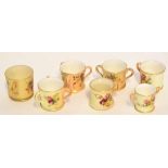 Collection of Royal Worcester miniature tygs and mugs all decorated with flowers on a blush