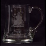 Late 20th century clear glass mug with applied handle and etched detail for the Norfolk Regiment,