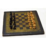 Cased set of turned wood chessmen in Staunton pattern, together with an antique painted wooden chess