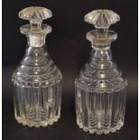 Pair of Victorian pillow cut glass decanters with mushroom knops, 25cm high