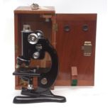 Mid-20th century black finished and chrome monocular microscope, Beck - London, "London model",