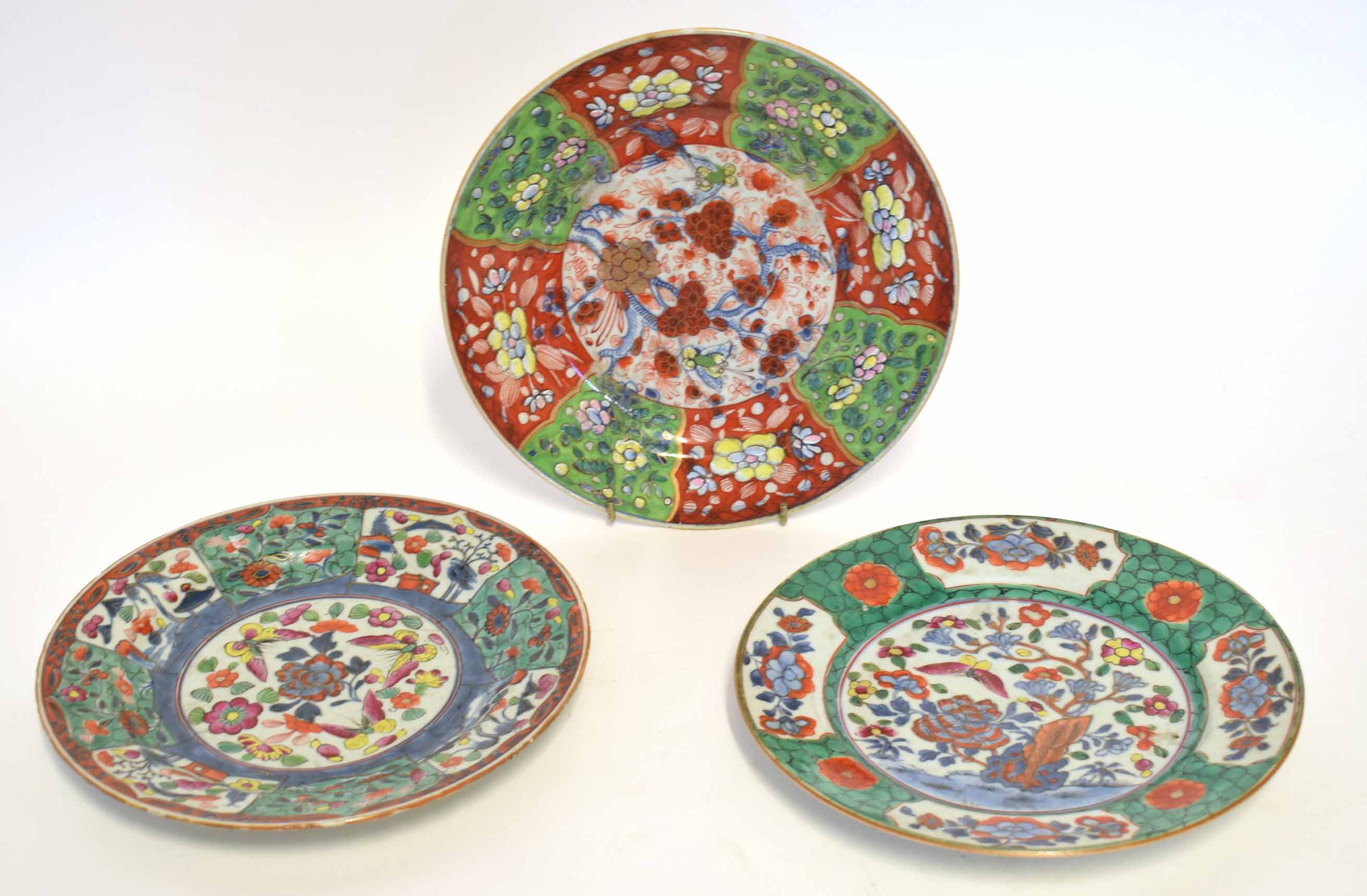 Three 18th century Chinese porcelain plates, the underglaze blue design with European style