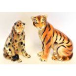 Group of two pottery models, one of a tiger cub, the other of a leopard, tallest 40cm high