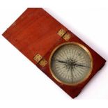 19th century mahogany cased compass of hinged and square form with fluted inset bezel and glazed