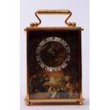 Modern Swiss lacquered brass timepiece, plinth shaped case with carry handle on faceted feet to a