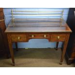 Edwardian three-drawer desk with inlay to legs and drawers and brass rail to back, 106cm wide