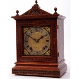 Early 20th century German oak cased mantel clock, Winterhalter & Hoffmeier, the overhanging