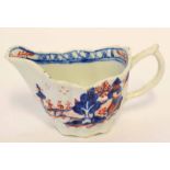 Lowestoft Chelsea ewer style cream boat decorated with the doll's house pattern (a/f), 6cm high