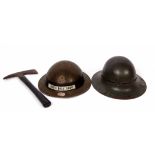 Mixed Lot: two various British steel fire helmets, the first dated 1939 with later decals and a