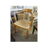 BEECHWOOD FRAMED CAPTAIN~S TYPE CHAIR WITH SPINDLE BACK AND UPHOLSTERED SEAT