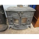 LARGE CAST IRON WOOD BURNING STOVE WITH DOUBLE DOOR FRONT