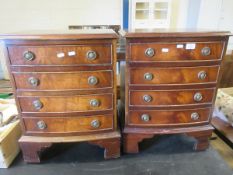 PAIR OF REPRODUCTION BOW FRONTED FOUR DRAWER BEDSIDE CHESTS WITH RINGLET HANDLES