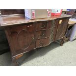 EDWARDIAN MAHOGANY SHAPED FRONTED SIDEBOARD WITH THREE DRAWERS CENTRALLY FLANKED EITHER SIDE BY