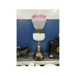VICTORIAN BRASS COLUMNED AND OPAQUE FONTED OIL LAMP WITH CRIMPED SHADE