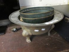 TOLEWARE OVAL PLANTER TOGETHER WITH A FURTHER BRASS THREE-FOOTED BOWL