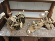 TWO RUSTIC FORMED MUSHROOM OR TOADSTOOL SCULPTURES