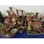 LARGE QUANTITY OF MIXED MODERN COPPER AND BRASS WARE TO INCLUDE A BUGLE SET OF COPPER JUGS VASES TEA