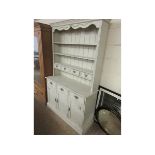 PAINTED PINE FRAMED DRESSER FITTED WITH THREE FIXED SHELVES WITH FOUR DRAWERS THE BASE FITTED WITH