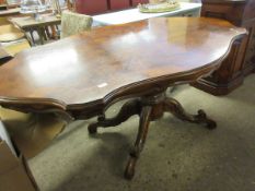 WALNUT SEGMENTED TOP LOZENGE SHAPED DINING TABLE WITH SINGLE PEDESTAL ON A SHAPED AND CARVED