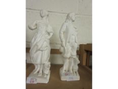 TWO PLASTER FIGURES OF A MAN AND WOMAN