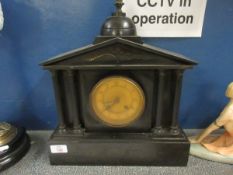 BLACK SLATE MANTEL CLOCK WITH FOUR COLUMNED FRONT