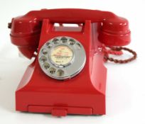 GPO vintage Bakelite telephone in red, model number 332L, paper label "Lowestoft 3241-3, extn 1"