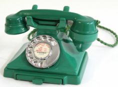 GPO vintage Bakelite telephone in green, model number 232 (162), paper label "Wakefield 6608",