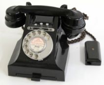 GPO vintage Bakelite telephone in black, model number 314F, paper label "Norwich 31122, extn.