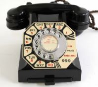 GPO vintage Bakelite telephone in black, model number 332L, unused paper label, applied large