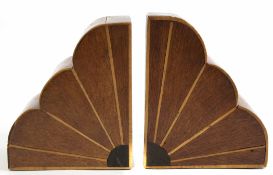 Pair of Art Deco oak sunburst cloud shaped book rests