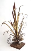 Mid-century designer floor piece in the form of a bulrushes with a central light, approx 140cm high