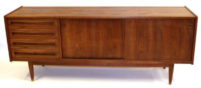 Mid-century good quality teak sideboard with four drawers and two sliding doors of Danish