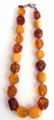 Good quality mid-20th century big bead amber necklace by Norwinska, mixed amber beads in egg yolk,