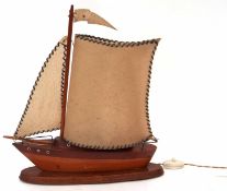 Mid-20th century wooden model sailing boat table lamp with composition sails, 34cm wide x 43cm tall