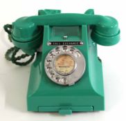 GPO vintage Bakelite telephone in green, model number 312L, paper label "Belgravia 5077, extn 37"