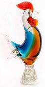 Murano type coloured glass cockerel on clear moulded foot, 32cm