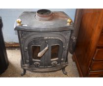 CAST IRON WOOD BURNING STOVE WITH FLUE