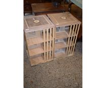 PAIR OF UNSTAINED AND INLAID REVOLVING BOOKCASES