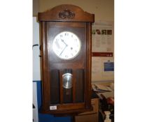 OAK FRAMED WALL CLOCK WITH DROP DIAL