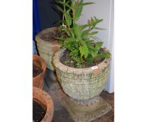 TWO CONCRETE URN FORMED GARDEN POTS