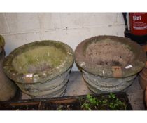 TWO CONCRETE CIRCULAR PLANTERS WITH SWAG DETAIL