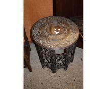 CIRCULAR CARVED TOP MOORISH TYPE TABLE WITH HEXAGONAL FOLDING BASE