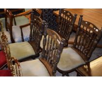 SET OF FOUR DARK BEECHWOOD STAINED SPINDLE BACK PUB TYPE CHAIRS WITH GREEN DRALON UPHOLSTERY