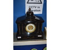 BLACK SLATE MANTEL CLOCK WITH COLUMNS AND ENAMELLED CHAPTER RING