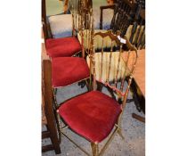 SET OF THREE BRASS FRAMED BEDROOM CHAIRS WITH RED DRALON UPHOLSTERY
