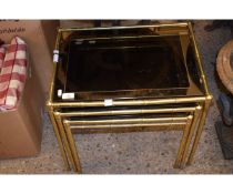 THREE BRASS FRAMED NESTING TABLES WITH GLASS TOPS