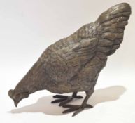 Patinated bronze model of a pecking chicken, 23cm