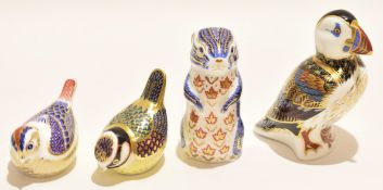 Group of four Royal Crown Derby paperweights including a Puffin and ducks, Puffin 12cm high (4)