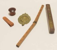 Vintage folding rule, spirit level, brass commemorative pendant etc