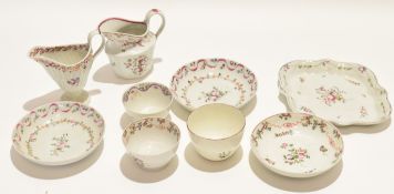 Group of late 18th century New Hall porcelain comprising two milk jugs, tea pot stand, two tea bowls